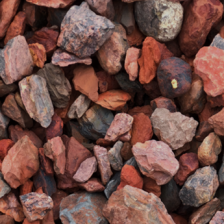Ideal Supplies MB Mojave-Blend-deep-red-browns-grays. Ideal Supplies has 1 1/4 inch to 2 inch varied varied colors of deep reds to browns with a little grays thrown in decorative landscape rocks for your next project.